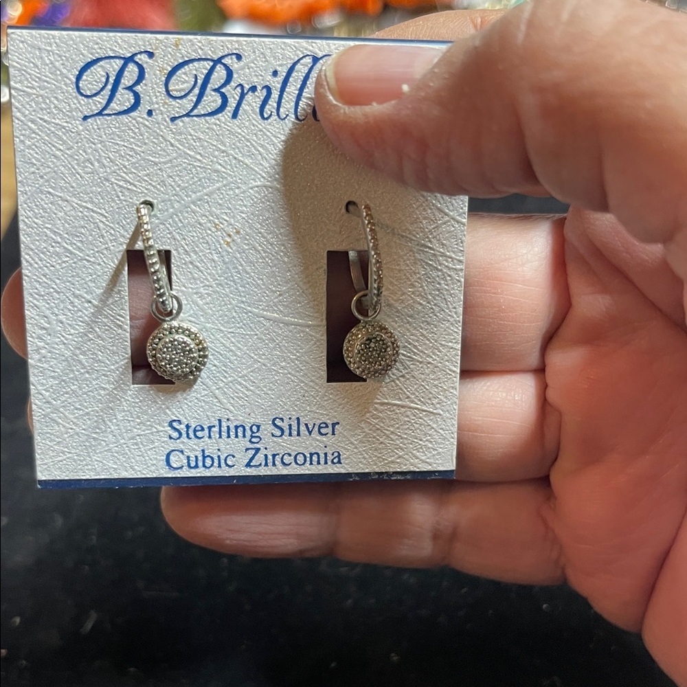 B. Brilliant Hoop Pierced Earrings. P